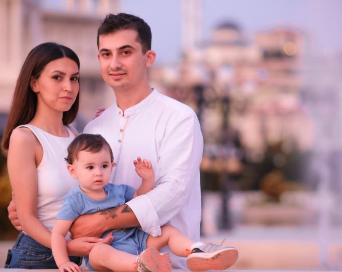 Charming family enjoying a day outdoors in Ankara, capturing delightful emotions.